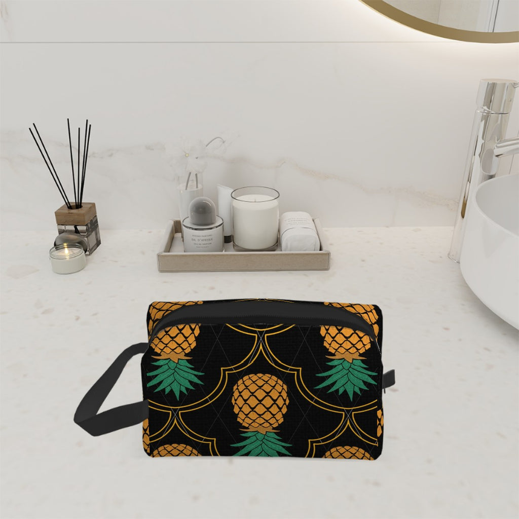 Upside Down Pineapple toiletry bag, swinger toiletry bag, Wicked Lifestyles, Wicked Lifestyles bag. Swinger toiletry bag sitting on a counter.