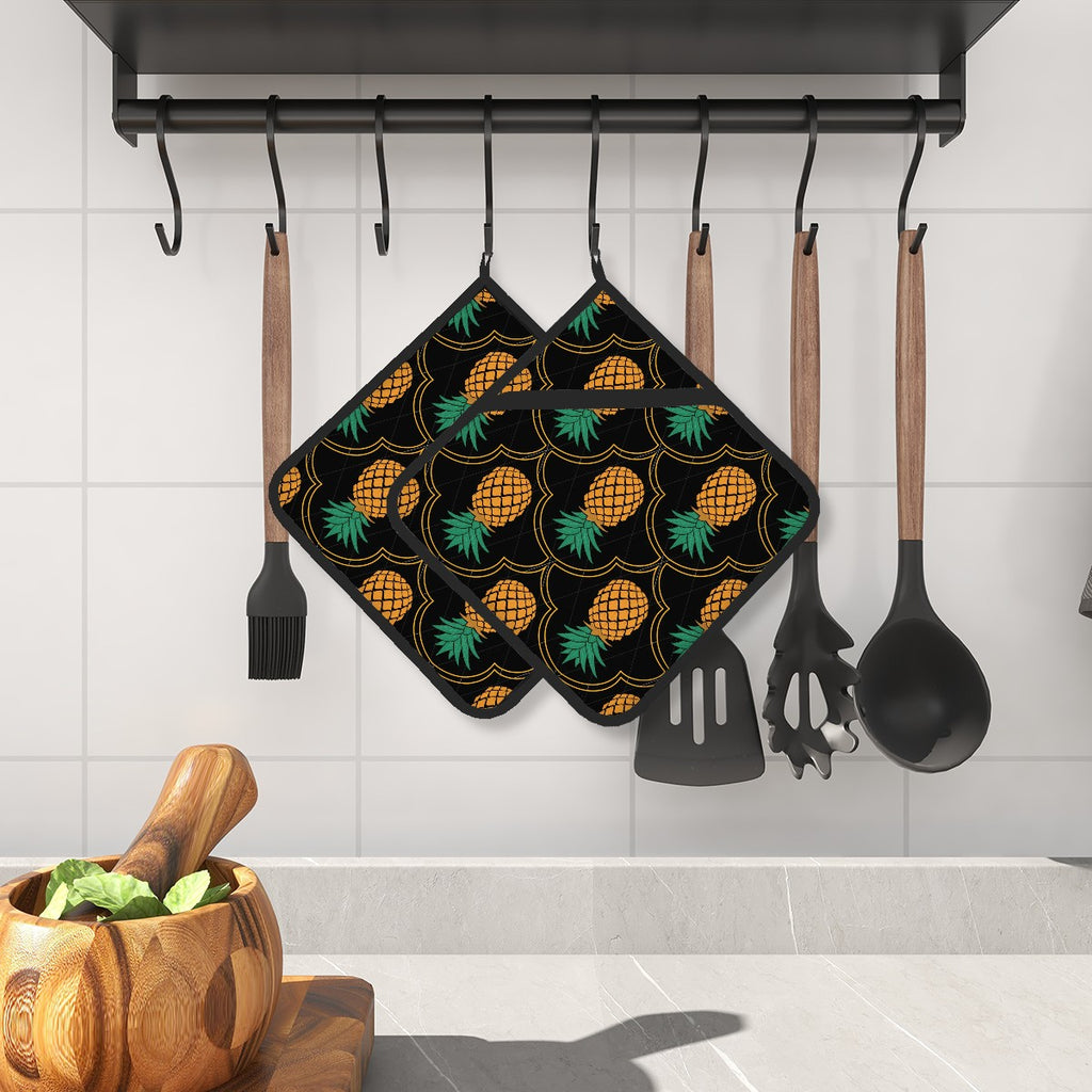 Luxury Upside-Down Pineapple pot holder hanging in a kitchen beside other utensils for a swinger lifestyle inspired home decoration theme.